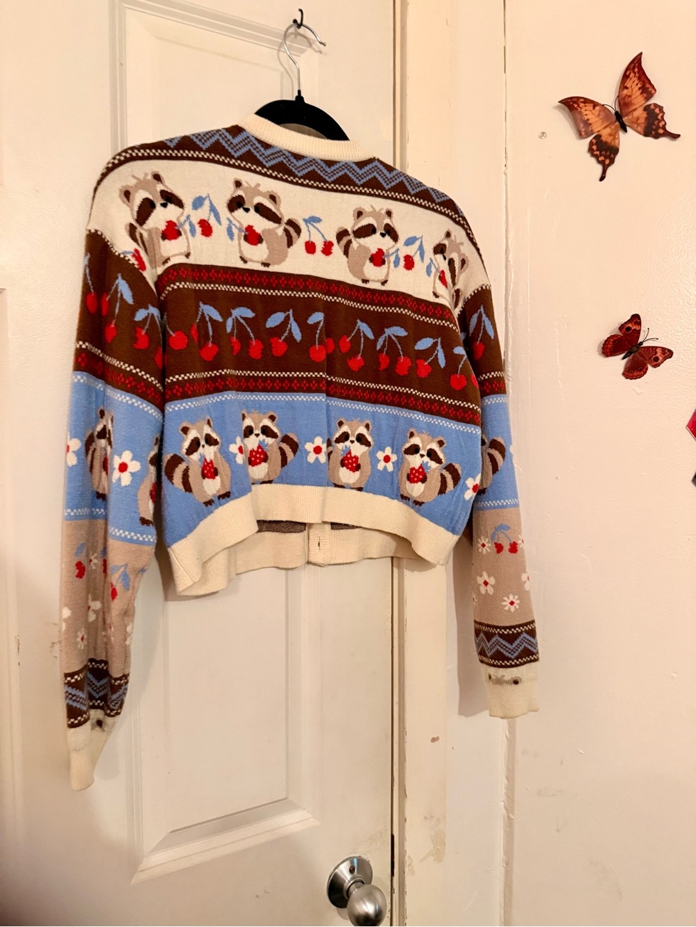 Thorn & Fable Blue and Brown Raccoon Pattern Cropped Cardigan Sweater - Picture 3 of 3
